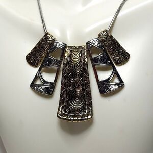 Bib necklace Gold and silver colors with round chain. 16 in